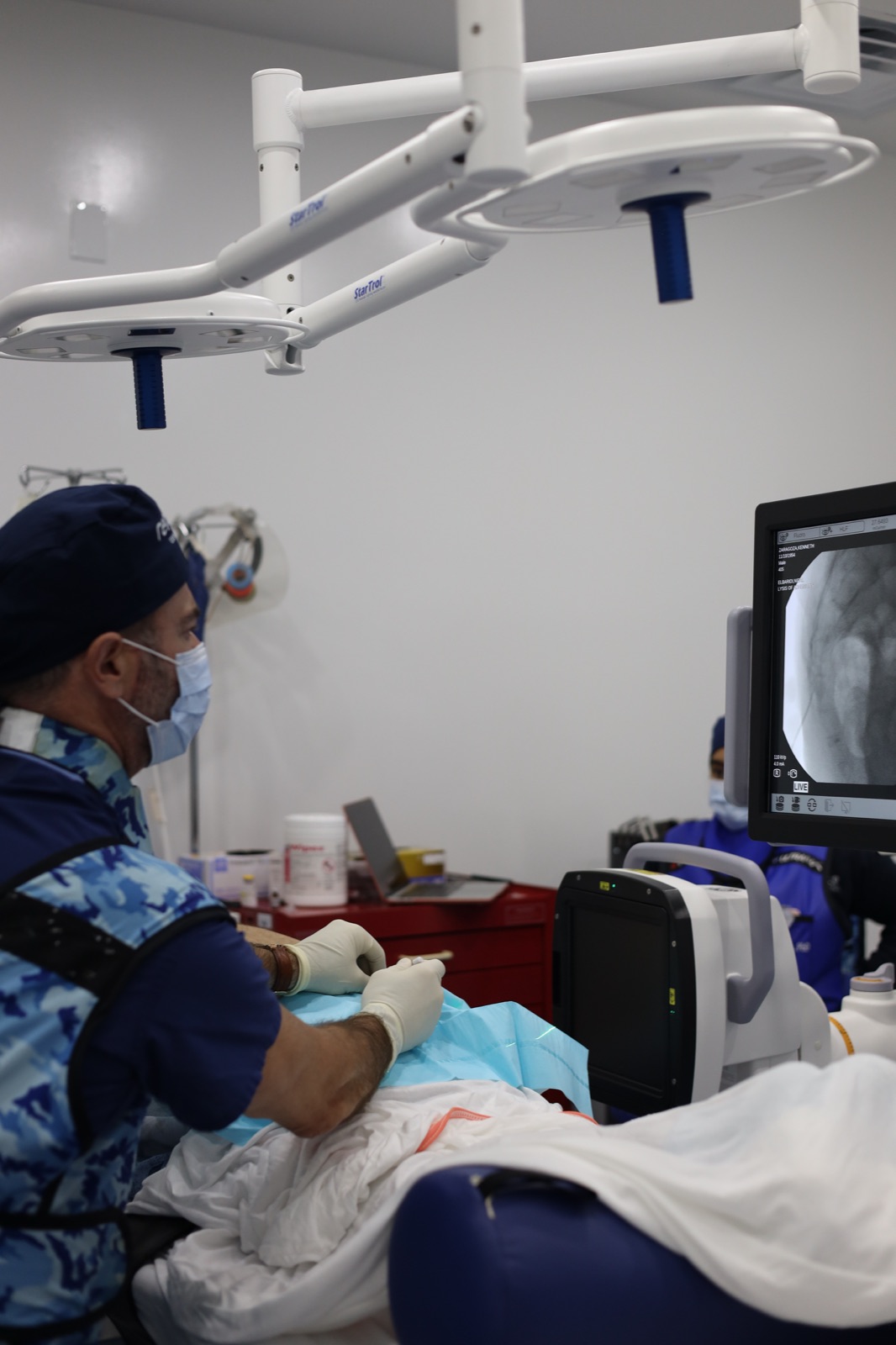 Dr. Elbaridi performing a fluoroscopy-guided pain procedure
